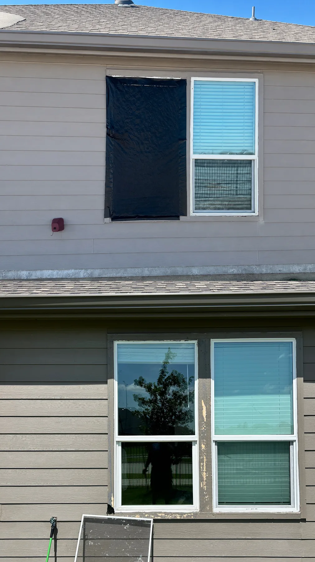 Second-story replacement window installation